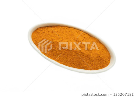 Turmeric (Curcuma) powder on white plate isolated on white background 125207181