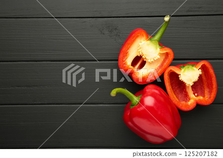 Red sweet pepper on black background. Space for text. Flat lay 125207182