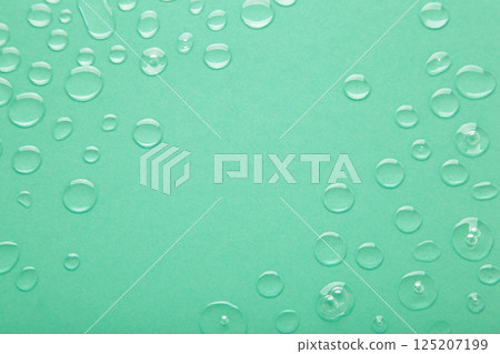 Water drops on mint background. Space for text 125207199