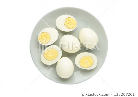 Boiled eggs on plate isolated on white background. 125207201