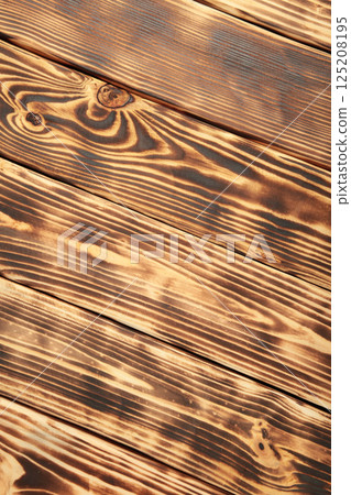 Brown wood plank wall texture background. Vertical photo Brown wood plank wall texture background. Vertical photo 125208195