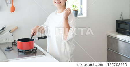 Woman cooking (fist pump) Woman cooking (fist pump) 125208213