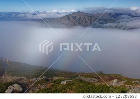 The Brocken phenomenon and the Kitamata-dake ridgeline seen from the summit of Mt. Iide 125208658