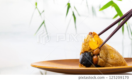 Traditional Chinese glutinous rice cake, containing rich bean paste 125209170