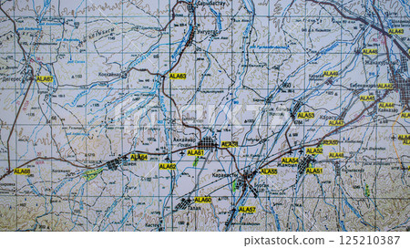 Topographic map with geographical coordinates, roads, terrain contours and marked locations, abstract background Topographic map with geographical coordinates, roads, terrain contours and marked locations, abstract background 125210387