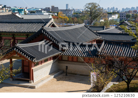 View of Traditional Korean Roof from above of Hwaseong Haenggung, temporary palace where the king used to stay when he traveled outside of Seoul, South Korea. It is famous as K-drama filming location. View of Traditional Korean Roof from above of Hwaseong Haenggung, temporary palace where the king used to stay when he traveled outside of Seoul, South Korea. It is famous as K-drama filming location. 125210630