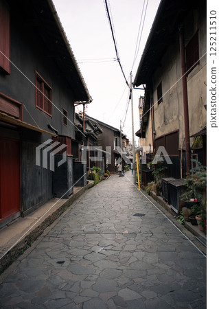 Tomonoura, a Japanese heritage site and UNESCO World Memory, an important preservation district for groups of traditional buildings Tomonoura, a Japanese heritage site and UNESCO World Memory, an important preservation district for groups of traditional buildings 125211510