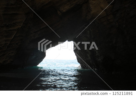 The sea which can be seen from the cave The sea which can be seen from the cave 125211891