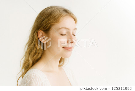 A profile of a young lady 125211993