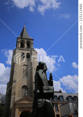 Saint-Germain-des-Prés, the oldest church in Paris, and a bust of Picasso Saint-Germain-des-Prés, the oldest church in Paris, and a bust of Picasso 125212480
