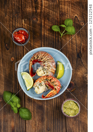 Roasted large lobster tail. Roasted large lobster tail. 125212548