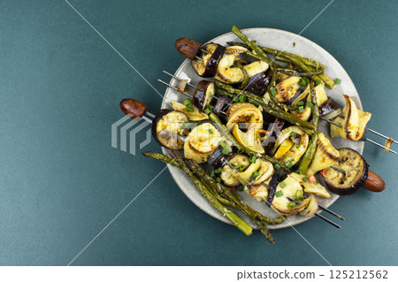 Freshly fish kebabs on skewers, barbecue. Freshly fish kebabs on skewers, barbecue. 125212562