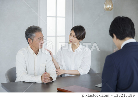 Salesman, senior and family having a meeting 125213199