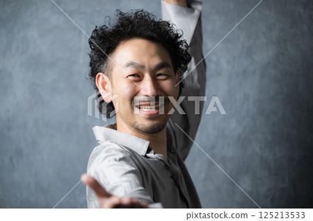 A bearded man dancing A bearded man dancing 125213533
