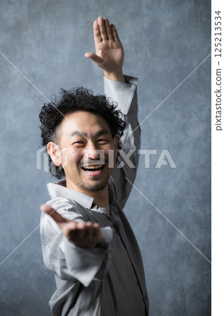 A bearded man dancing A bearded man dancing 125213534