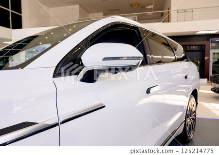 Close up view of the side of a new modern white car 125214775