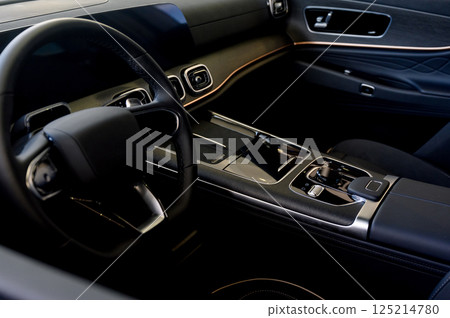 Close up of modern new car interior with black leather seats 125214780