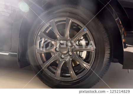 Car wheel with brake calipers and stylish design. Car wheel with brake calipers and stylish design. 125214829