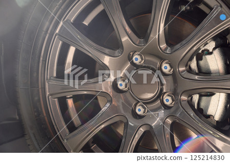 Car wheel with brake calipers and stylish design. Car wheel with brake calipers and stylish design. 125214830