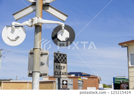 Level crossing with circuit breaker Level crossing with circuit breaker 125215424