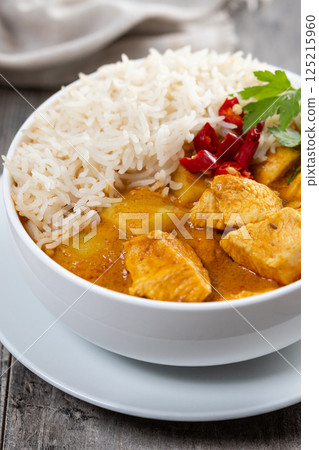 Massaman curry isolated on white background. Traditional Thai food recipe Massaman curry isolated on white background. Traditional Thai food recipe 125215960