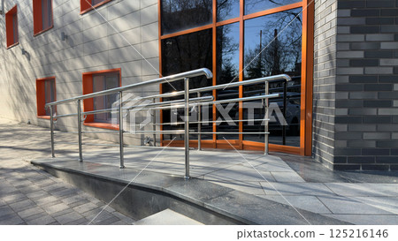 Ramp for people with disabilities to access building. Entrance facilities for people with mobility problems to conveniently entrance. Care for people with health problem and creating accessible areas Ramp for people with disabilities to access building. Entrance facilities for people with mobility problems to conveniently entrance. Care for people with health problem and creating accessible areas 125216146