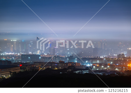 Twilight Dreams: Taichung City Beneath the Veil of Spring Mist. 125216215