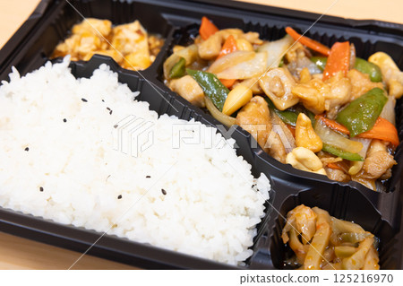 Delicious fried chicken and cashew nuts bento Delicious fried chicken and cashew nuts bento 125216970