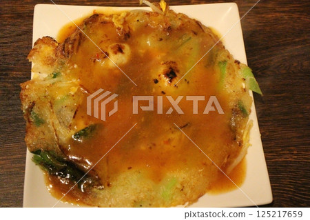 Taiwanese Cuisine - Oyster Omelette Taiwanese Cuisine - Oyster Omelette 125217659