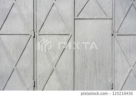 Close-up shot of metal door background. Close-up shot of metal door background. 125218430