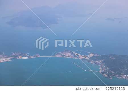 Aerial View of Coastal Harbor and Islands During Daytime 125219113