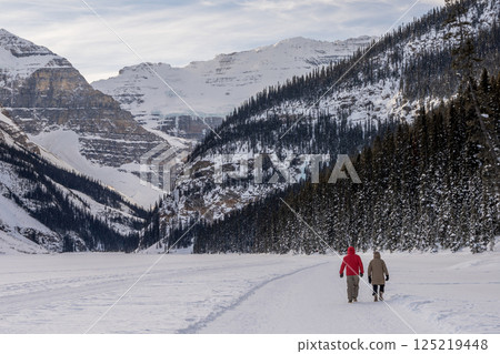 People walking on a snowy trail Lake Louise Winter hiking 125219448