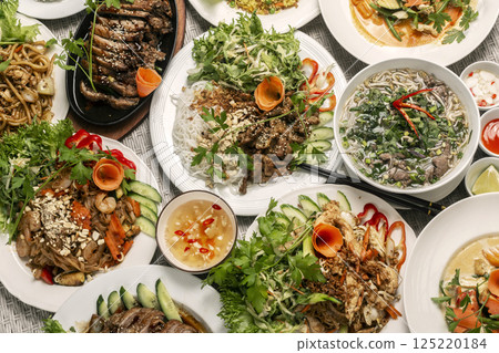 assortment of mixed traditional vietnamese food dishes on buffet table 125220184
