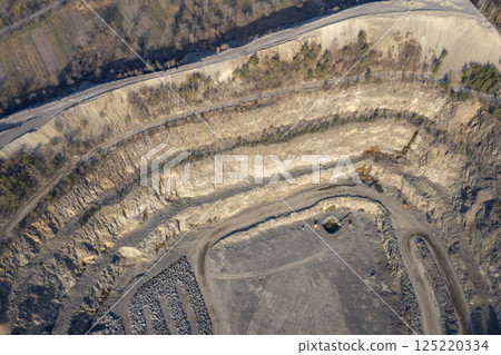 Open pit granite quarry, view from above Open pit granite quarry, view from above 125220334