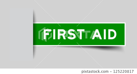 Green color square shape sticker label with word first aid inserted in gray background Green color square shape sticker label with word first aid inserted in gray background 125220817