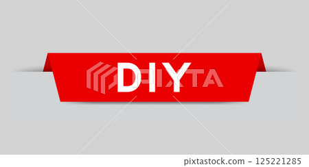 Red color inserted label with word DIY (abbreviation of do it yourself) on gray background Red color inserted label with word DIY (abbreviation of do it yourself) on gray background 125221285