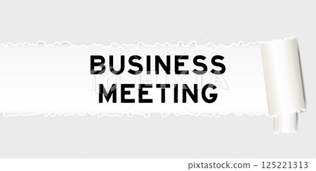 Ripped gray paper background that have word business meeting under torn part 125221313