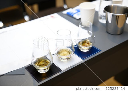 Unique whiskey tasting experience at a stylish bar with elegant glasses Unique whiskey tasting experience at a stylish bar with elegant glasses 125223414