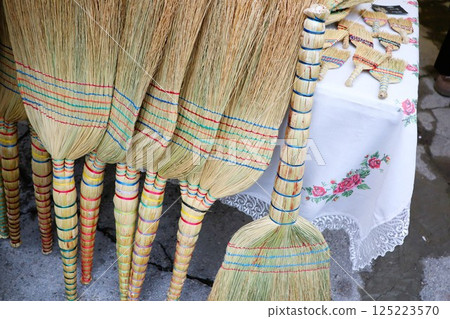Beautifully Colorful Handmade Brooms Perfectly Crafted for Traditional Cleaning Tasks 125223570