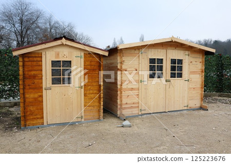 Wooden Storage Sheds Designed for Use in Your Garden or Backyard for Various Needs 125223676