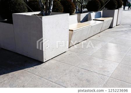 Exploring Modern Urban Landscaping Techniques with Stylish Concrete Planters and Elements Exploring Modern Urban Landscaping Techniques with Stylish Concrete Planters and Elements 125223696