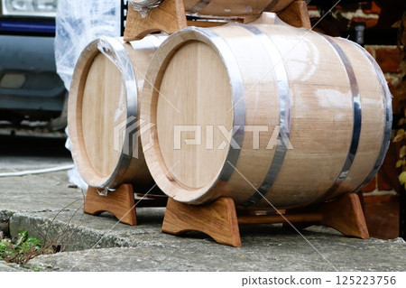 Wooden Barrels Are Essential for the Aging Process of All Types of Beverages Like Wine 125223756