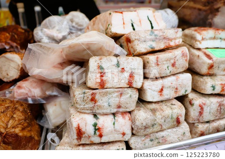 A wide variety of colorful packaged food items can be found at a local market today 125223780