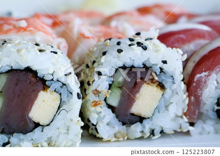 Indulge in Delicious Sushi Rolls, Crafted with Fresh Ingredients That Bring Flavor to Life 125223807