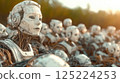 A field of humanoid robots lit by the setting sun outdoors 125224253