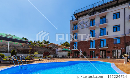 Hotel Gino Wellness: A Picturesque Poolside Oasis Perfect for Relaxation Surrounded by Nature, Offering Comfort and Luxury for All Guests' Dream Getaway Experiences 125224714