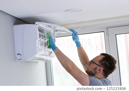 Efficient Cleaning of an Air Conditioner: Importance of Maintenance for Optimal Performance and Air Quality in Indoor Spaces 125225806
