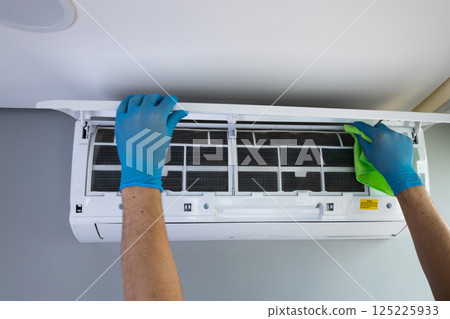 Efficient Air Conditioning Maintenance: A Guide to Cleaning Wall-Mounted AC Units for Optimal Performance and Longevity Efficient Air Conditioning Maintenance: A Guide to Cleaning Wall-Mounted AC Units for Optimal Performance and Longevity 125225933