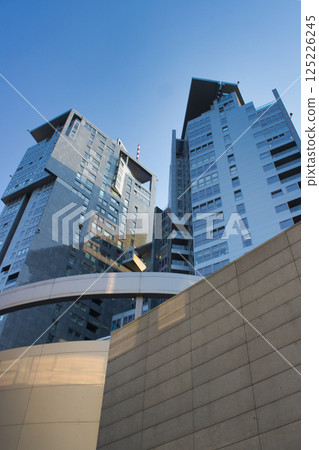 Modern high-rise buildings in Gdynia seen from below Modern high-rise buildings in Gdynia seen from below 125226245