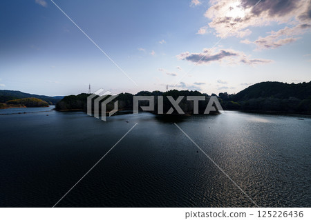 Lake Nunome bathed in the soft spring sunlight at Nunome Dam in Nara City, Nara Prefecture② 125226436
